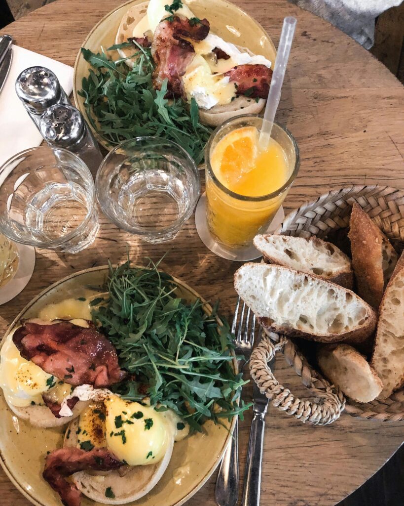 Foods and Juice Served on Brown Table